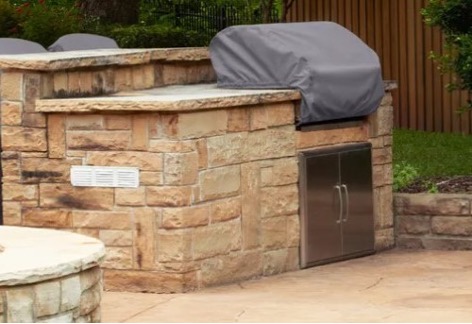 grill cover on outdoor grilling station